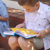 truly amor kids journal boy relaxing and writing in the journal